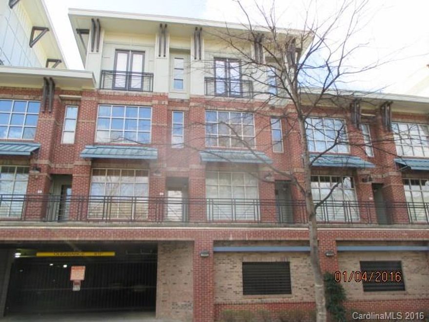 Part. brick condo home located in 1st Row Warehouse Subdivision. Home features 2 bedrooms, 2 bathrooms, kitchen and living room. Home has some wood floors, ample kitchen cabinet spaces, neutral colors throughout, and deck. Water and sewer provided by the HOA. There is a garage for the building with assigned parking spaces. The space assigned to unit 404 is 82. HOA requires "Move in Regulations" form completed by the new owner once the home is closed. Highest & best deadline is 1/13/16 at 10 AM.