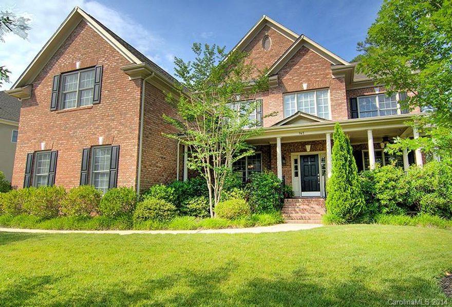 Traditional elegance, executive living! Full brick beauty located on a cul-de-sac across from lake. Generous room sizes, open floor plan, gorgeous gourmet kitchen, large master suite, dual, first story guest suite w/full bath, spacious secondary bedrooms, bonus room on second level can be 6th bedroom, third story rec room can be a bedroom or home office, 3 car garage. Home Warranty Included. Tega Cay Vacation Lifestyle, Fort Mill Schools. SELLER IS MOTIVATED- RELOCATION, MAKE AN OFFER!