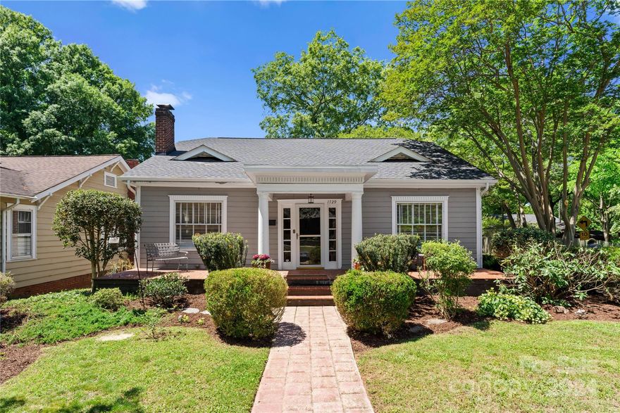 BungaLOVE Alert!!  Historic district bungalow with all the charm and space you have been waiting for.  This adorable cottage has spacious rooms and high ceilings, thick baseboards, and picture moldings.  The classic center hall design offers 3 large bedrooms, (one currently used a a den) and two full bathrooms. You'll love the oversized living and formal dining room with bay window. You'll love the vintage inspired kitchen with its inset cabinetry, gorgeous countertops, open shelving and a new gas range. The cute butler's pantry has a large closet with tons of storage. The primary bedroom features a ensuite bath with large shower and walk in closet and extra room to expand the closet. The hall bath has its original built-ins, tub, and new mosaic tile floor. Located on one of the "favorite" Thomas Ave. blocks, just a short walk to the shops and restaurants.  The corner lot offers two off street parking spots, and huge deck across the rear of the home.