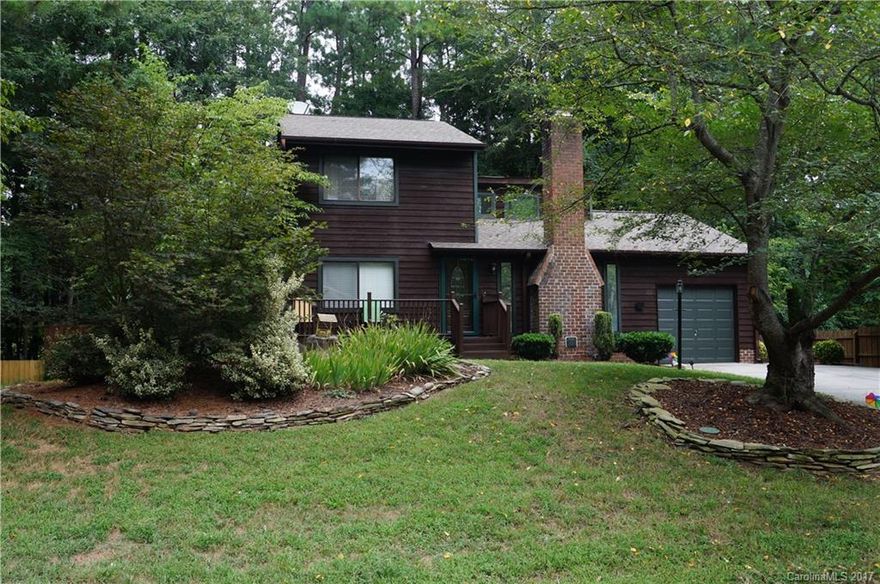 Open floor plan w/Master on the Main, Vaulted ceilings, Gas fireplace, Hardwoods on the main, Kitchen w/breakfast bar, Granite countertops, faux finished cabinets, & lots of storage. Two bedrooms on second floor w/full bath. Large low maintenance fenced-in backyard w/block patio, built in wet bar & gas grill. New furnace 2014. Seller is providing a Choice Plan 1 year HW. Amazing South Charlotte location, Close to shopping, medical and I-485. Enjoy the mature trees and beauty of this community.