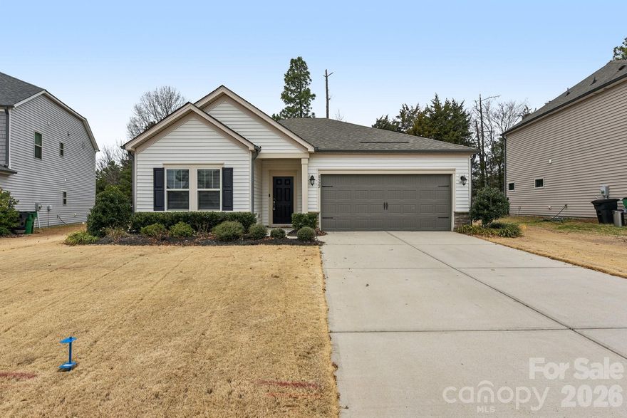 HOME WON’T LAST LONG, PRICED BELOW MARKET VALUE!  This contemporary ranch home is located in the desirable Steelcreek neighborhood of Haywyk Meadows. It is a beautifully designed three-bedroom, two-bath ranch-style home featuring the popular Berkshire open-concept floor plan. Step inside through the inviting foyer and enjoy a spacious kitchen that seamlessly flows into the living and dining areas, complete with a pantry and a blend of carpet, tile, vinyl plank, and wood flooring throughout. The generous secondary bedrooms offer comfort and flexibility, while the private owner’s suite is thoughtfully secluded and features dual sinks and a large walk-in closet. Additionally, the property features a Rain Bird in-ground irrigation system. A two-car garage provides ample storage. Residents enjoy fantastic community amenities, including a swimming pool with cabana and a playground— perfect for relaxation and recreation.