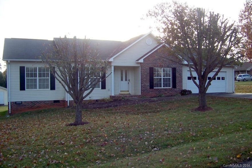 Exceptional condition in this 3 bedroom, 2 bath home located on level, corner lot. Hardwood floors, vaulted ceilings, open Great Room to the kitchen with oak cabinets, room over the cabinets for decor. Much of the interior & molding just painted--even the garage & inside closets. Relaxing spa like color in master bedroom with private bath has dual vanity sinks, WIC inside the bathroom as well & 2nd closet inside the master bedroom. Both bathrooms have tile floors. Seller is leaving portal FP.