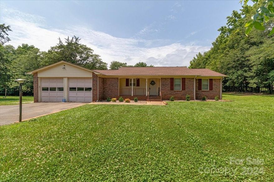 Discover the perfect blend of country living and endless potential with this charming 3-bedroom, 2-bath full brick ranch home, nestled on 3.5 acres of usable land. This fixer-upper offers a solid foundation and classic brick exterior, providing a great canvas for your dream home. Enjoy the privacy of mature trees, ample space for your RV or boat, and the proximity to Lake Wylie for boating and fishing. With no HOA restrictions, embrace a self-sufficient lifestyle by bringing your chickens and horses(verify zoning in associated docs), or enjoy riding four-wheelers and relaxing around a cozy fire pit. While the home requires some updates, it presents an excellent opportunity to customize to your style and preferences, making it a perfect haven for creating cherished memories.