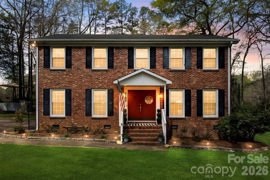 Located on the 11th fairway of the Pinetuck Golf Course, this all-brick, colonial-style home offers significant potential. Situated on a 1.88-acre lot, the property features a classic four-square design with a spacious yard and includes two additional storage buildings. The interior layout is well-suited for a variety of needs. The main level includes a Living Room, Dining Room, Den, Kitchen, Half Bathroom and Laundry. The upper level provides four Bedrooms and 2 Bathrooms. One of the highlights of the home is the screened-in back Porch, which overlooks the golf course and provides a quiet space to enjoy the Carolina weather. The home is conveniently located near the Pinetuck Club and I-77, offering an easy commute to Charlotte. While the property is ready for personal updates and touches, its foundational features and prime location make it an excellent opportunity.