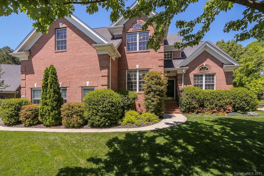 PRIVATE!Full brick on cul-de-sac w fenced back yard & front/back irrigation.Beautifully landscaped.Large deck.This home will impress even the pickiest buyer w its upgrades.Two story foyer & great room.Lots of natural light.Granite & stainless in gourmet kitchen w gas cooktop.Master down has large bay sitting area.Additional bedroom on main. Laundry room w tile floors.Sitting/loft area upstairs w bedrooms,Huge bonus w custom built in entertainment area & loft.Hardwood floors in main living areas.