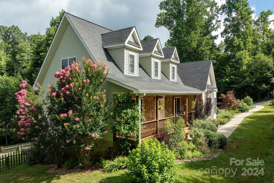 Welcome to 34 Creek Run where you will find this move in ready home has been carefully loved & meticulously maintained. Outdoor spaces are tastefully landscaped with year round flowering shrubs & trees. Large private rocking chair front porch, covered rear deck with trex type decking that overlooks a private rear yard with a year round creek & mountain views. Entering the home you will find 9 ft ceilings,  hardwood floors in foyer, dining (multi flex area), living room with a cozy gas log fireplace, breakfast nook & master suite. Master offers a large bath with tiled shower & soaking tub. Upper level offers 2 bedroom split bedroom plan, large bonus room in middle & a full bath. Basement has plenty of room for a ready to finish space or excellent storage, shop, craft room etc. The 2 car garage is oversized with shop-storage tool area. Rounding off this awesome home is a paved road, paved drive, a rear yard with lots of garden space & plenty of room for a playground. NOT in floodplain