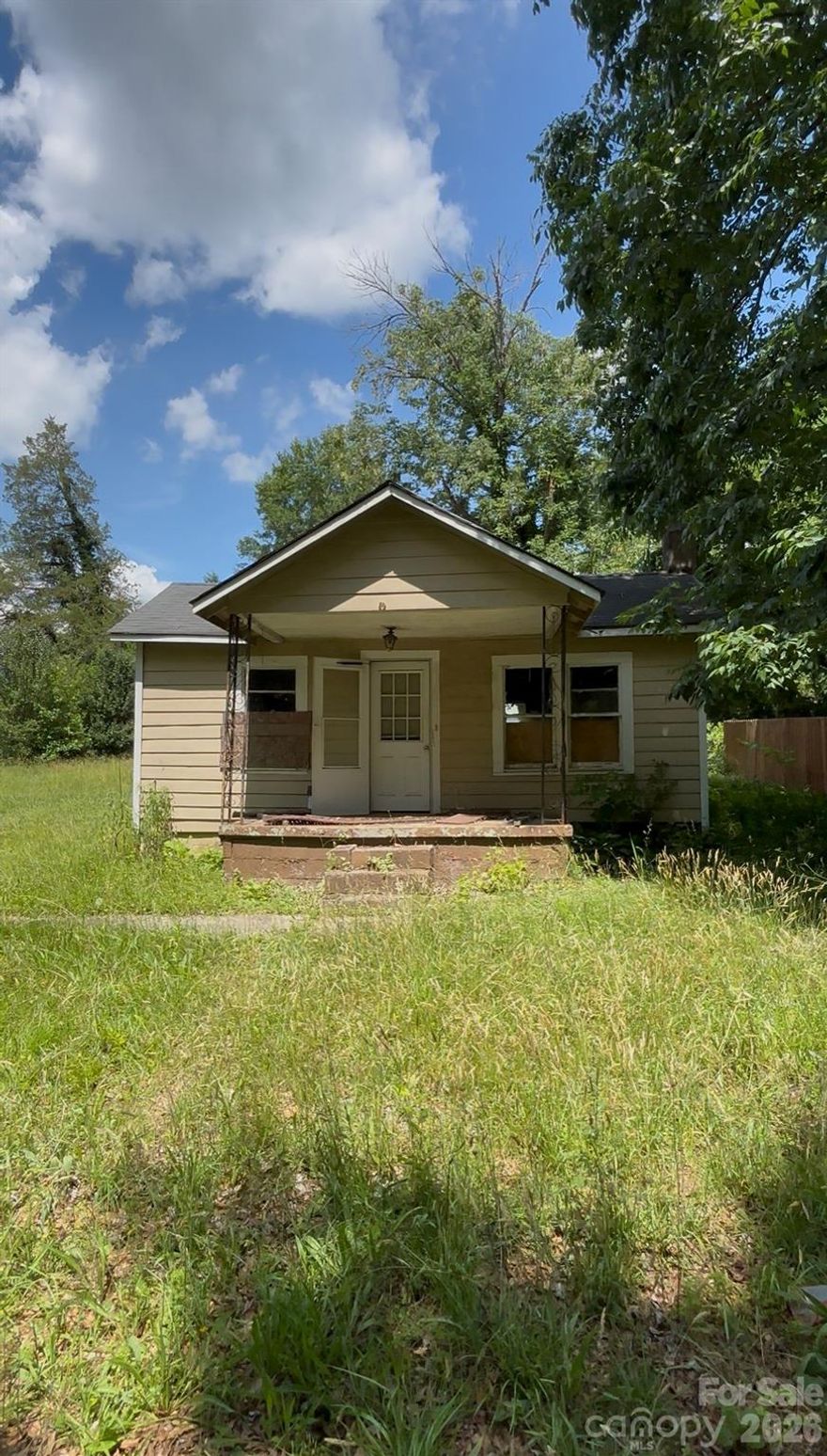 Investor opportunity in one of the Charlotte metro's fastest-moving submarkets. This 1950 cottage/bungalow is
sitting on 650 square feet with 2 bedrooms and 1 bath.  The home is currently uninhabitable and requires a full rehab. This is down-to-the-studs vision territory.  

Sold strictly as-is. Seller will make no repairs. Cash, hard money, or renovation loans only (203k or similar).

All offers MUST include proof of funds or a pre-approval from a hard money or renovation lender.

Buyers Agent to verify Square Footage, Utilities and any other pertinent information.