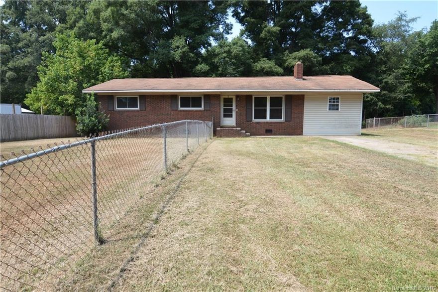 Location, location, location! Adorable home with so much potential! 3 Bedrooms, 1 full bathroom, huge fenced in back yard with mature foliage. Award winning Fort Mill School District. Home is sold as is.