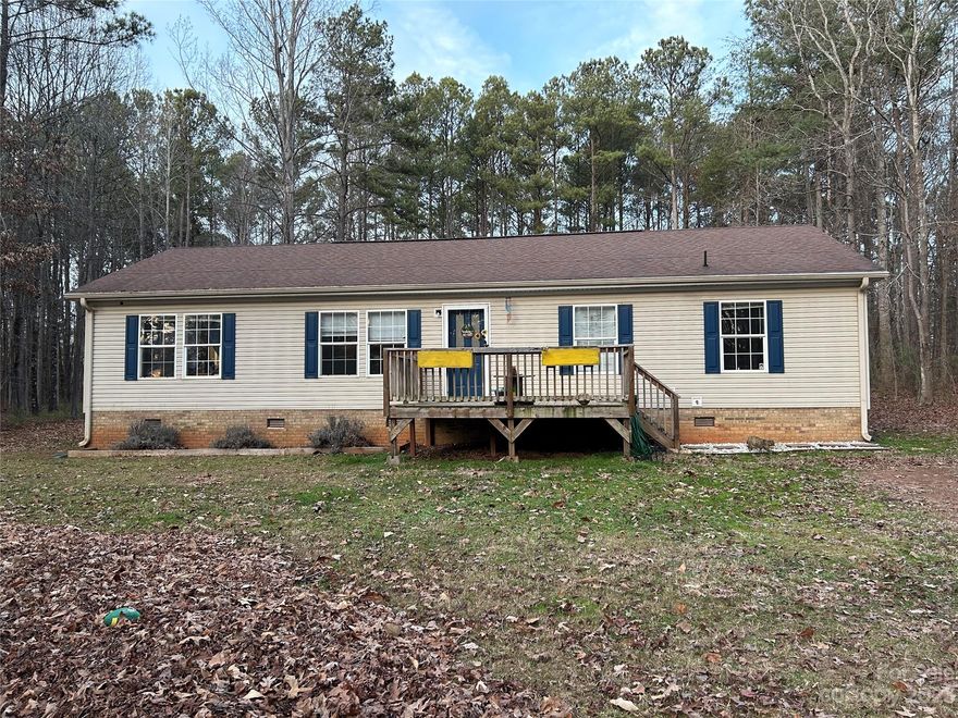 Secluded oasis in the heart of Denver.  Escape the bustle without leaving the city!  Beautiful, meticulously maintained, move in ready ranch style home tucked away on almost 2 acres of land.  Gather everyone comfortably in the open concept living space.  Splash into summer fun in the sparkling new above-ground pool with new deck!  Stainless steel fridge, granite countertops, and laminate wood flooring in kitchen, dining room and entranceway.  Granite countertops and double sink vanity with walk-in shower, deep tub and walk-in closet in master bath.  Great yard for kids and/or entertaining.  Sit out on the front porch and watch the kids swing and play in the expansive yard. Well built tree house out back, go cart and white cabinet in bathroom convey with home!  8x8 storage shed and 2-car carport.  New HVAC in 2020, new water heater in 2023.  Schedule your showing today, and step into your dream home.