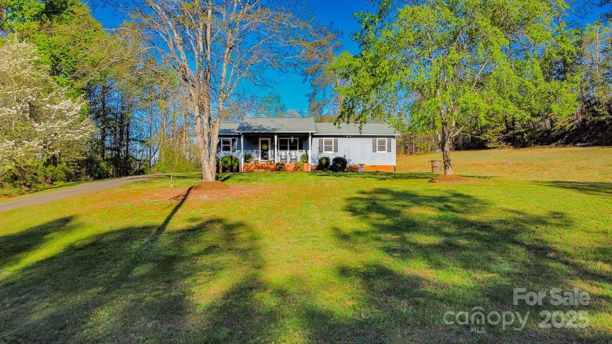 This adorable home sits on over 7 acres in beautiful, quaint Bostic NC! Only 8 minutes from Main Street Forest City with shops and restaurants - you have the best of both worlds, county living and convenience to town. Featuring a huge family room, 3 bedrooms, 3 bathrooms, eat-in kitchen and large dining room The home offers ample storage inside and outside. Enjoy a peaceful, private backyard featuring a nice deck and a 12'x16' Greenhouse.