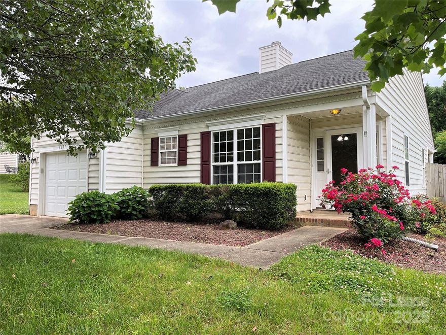 This beautiful 3 bed, 2 bath, 1,200 sq. ft. ranch home in the Cambridge Commons community of Charlotte is just waiting for you!  Gorgeous wood laminate floors welcome you into your open living room with vaulted ceilings and a decorative fireplace (non-functioning). The eat-in kitchen features stainless steel/black appliances, crown molding and updated light fixtures.  Your first floor primary bedroom boasts a walk-in closet and an en suite bath with a dual sink vanity and garden tub.  Washer and dryer are included for resident use. Two additional bedrooms share a second full bath. This home offers a lot of space with convenient main-floor living! Enjoy outdoor dining and relaxing on the backyard patio! Other backyard features include a fence, a raised garden bed and a storage shed.