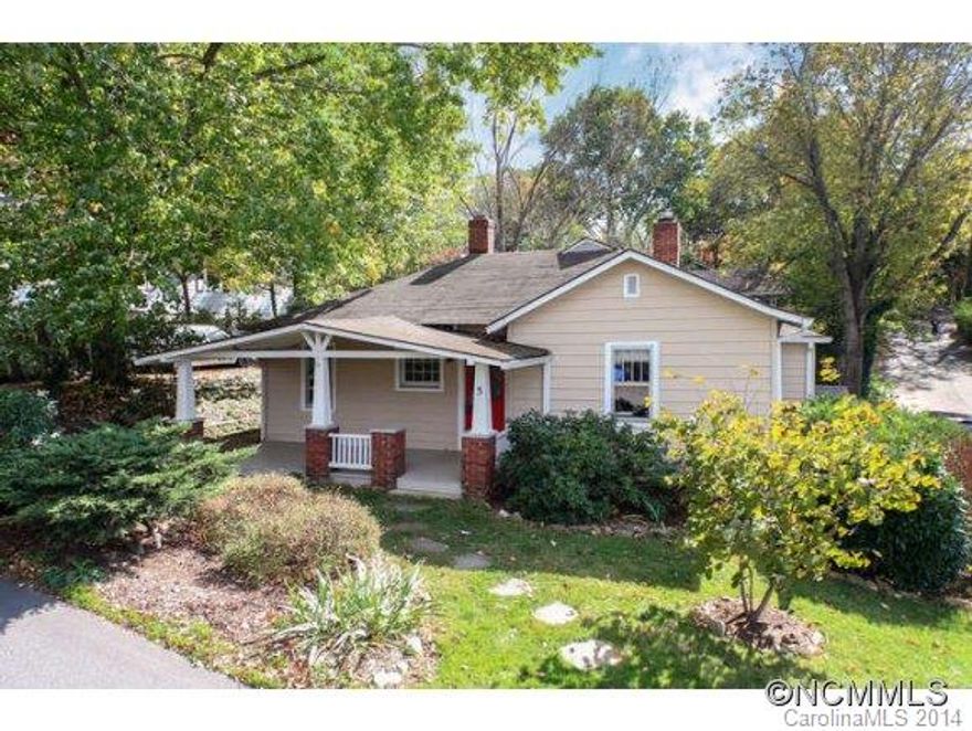 Just in time for the holidays! Price reduction on this lovely North Asheville charmer features 2 BR/1 BA, Fireplace in living room (non functional), beautiful hardwood floors, enclosed patio, nicely landscaped yard and outbuilding for extra storage. Convenient to all things North Asheville!