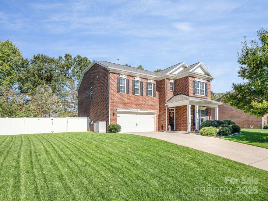 Fall in love with this full-brick home featuring modern upgrades and exceptional outdoor living, where style and comfort meet in every detail. The kitchen is a true showstopper, boasting a stunning white quartz island and countertops, a large stainless-steel farmhouse sink, updated stainless-steel appliances, and a fully shelved walk-in pantry. Custom built-in shelving in the family room creates a warm and inviting gathering space, while additional built-ins in the office enhance organization and productivity. A spacious dining room is perfect for hosting family and friends. Beautiful wood flooring extends throughout the main floor, staircase, and upstairs hallway, adding a touch of timeless elegance. The expansive primary suite features a cozy sitting area, two large walk-in closets, and a remodeled spa-inspired bathroom with a modern soaking tub, separate vanities, and a beautifully tiled shower with a large rainfall showerhead. Outside you can enjoy the backyard oasis complete with a stamped concrete patio, pergola, and white vinyl privacy fence. Black shutters add to the home’s charming curb appeal, while the smart sprinkler system provides convenience and efficiency. This home offers a welcoming atmosphere, thoughtful updates, and spaces designed for comfort, connection, and lasting memories.