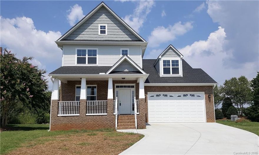 Impressive craftsman custom built home w/master down.   Brick & vinyl siding, lg front porch, lots of wood floors, tile baths, kitchen w/custom cabinets, island, soft close drawers, tile backsplash, pantry, stainless appliances, electric/convection oven, granite counter tops in kitchen & baths. Flex rm.  Two BR's up +Bonus/BR w/closet.  Walk in attic. Rod iron pickets on stairs. Master bath w/walk-in shower, laundry down, family rm w/ fireplace & shelves, deck, oversized garage.  In cul-de-sac.