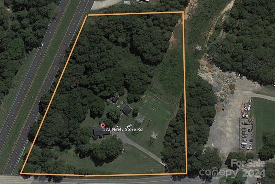 Prime location for development in one the fastest growing areas of South Carolina. 3.62 Acres of land zoned UD with tons of possibilities making this property a highly versatile property with a wide range of potential uses. Currently this site has a well and septic and county water is available at the street. There is currently a residential home on the property that could be used as an office along with a 20x20 outbuilding with power and a separate meter. Home is occupied and do not disturb without a scheduled appointment.
