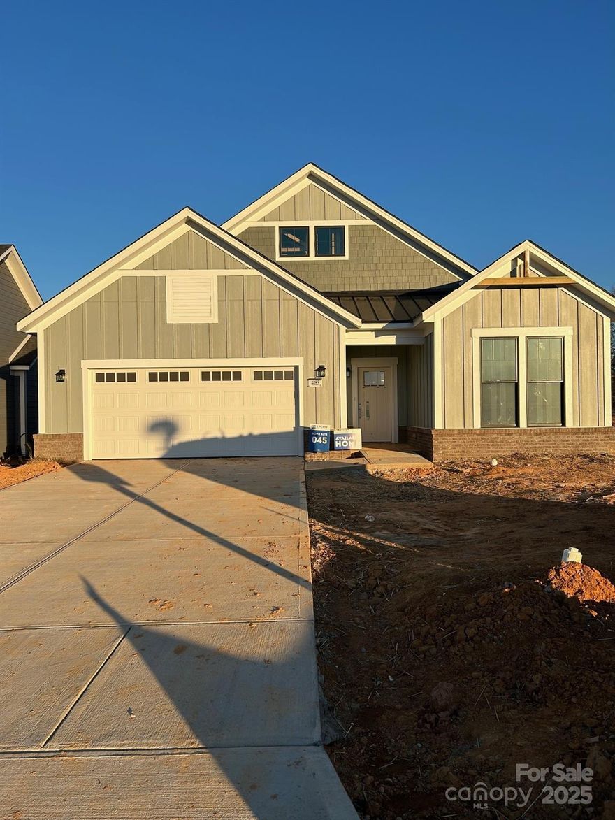 Inventory home - price has been reduced $25,000! Must close by 3/31/26. This luxury ranch home features the Portico floor plan with a grand entrance, open layout. Luxurious selections, such as deluxe owner’s suite featuring zero entry shower & deluxe kitchen. Spacious owner's suite w/ beautiful bathroom and ample storage space. Convenient features include a centrally located laundry room. This is our “GOLDILOCKS” home and our most popular floorplan as it seems to be “just right”.  The Courtyards at Hodges Farm community is conveniently located in the town of Charlotte, NC near the University District. The majority of homesites in this community back up to a mature tree line or green open space. Take advantage of future amenities including 2 clubhouses each with a fitness center, a sparkling pool, indoor/outdoor fireplace, screened porch and Pickleball court!  Enjoy a beautiful stroll through this park like setting community and explore the outdoors. This Quick Move-In home will be ready February 2026.