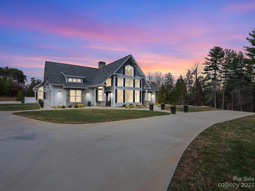 Never been occupied NEW home with spacious open floor plan with a beautiful see-through fireplace with the cathedral ceilings.  Large primary ensuite, separate thermostat and fireplace and large walk-in closet with built in vanity.  Connects to the massive size wash room, with a large soaking tub. European granite countertops and custom millwork with eastern white pine and knotty spruce wood in all the right places. The extremely large Kitchen is a dream for entertaining with the amenities you would expect in a high end home. The design of this home has been very carefully thought out. Oversize 3 car garage, with access to the unfinished 2nd living quarters space above the garage. A separate dog yard fenced in with its own draining system. Walking outside to the 2.43 acres, where a in-ground salt water pool with a lighted waterfall sits wrapped around concrete for guests to lounge around the pool. 13 camera security system with a entire home stereo system volume control in each room.