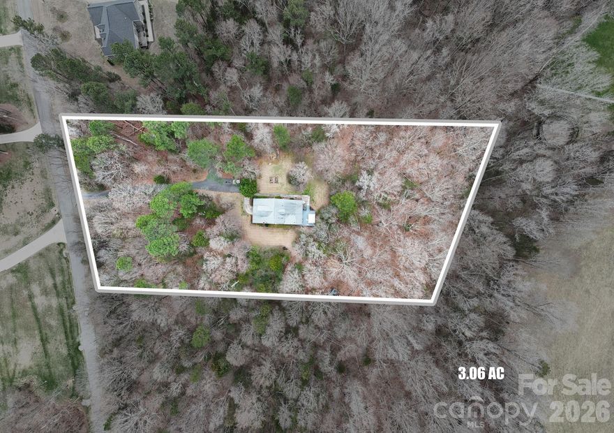 Build your dream home on this private 3.06-acre lot in the desirable Town of Huntersville! Enjoy the rare combination of privacy and convenience with no HOA, while being just minutes from shopping, dining, and entertainment at Birkdale Village, recreation on Lake Norman ), and an easy commute to Charlotte. A great opportunity to own acreage in a prime location with endless possibilities.