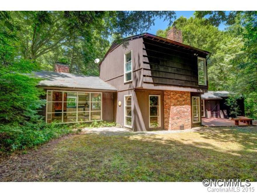 Unique, ideal for creative lifestyle! Designed/built by early, respected Landscape Architect/Engineer. Sunken LR & treehouse master suite added '70. Bonus studio w/unht'd bath. Detached workshop provides addt'l rooms for artistic/prof projects. Main living/deck provides unique views of private outdoor living areas. Room scale, natural lighting/ventilation sys influenced by Frank Lloyd Wright designs. AS-IS! Create dream home @ great neighborhood.