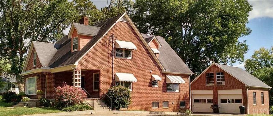 Walk to Historic Morganton from this Stately Brick home with lots of character. Has 4 LARGE bedrooms with 2 large bathrooms. Can u say CLOSETS? It has more than you can imagine. There is also a basement with exterior entrance and canning sink.The detached over sized garage has a flue with wood stove(wood need chimney inspected) and upper room finished with tonged and groove stained wood walls. 2 New heat pumps in 2011 and new sewer lines 2013. Hardwood floors on upper level and ground level just refinished. Has new paint inside and out. LOTS of storage space. Fireplace in living room would need inspection before being used.Garden area behind garage. Includes parcel Pin# 2703083024 & 2703083093