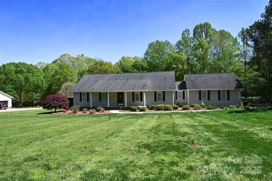 Look at this gem with beautiful country scenery and 3/4 acre!  A landscaped pathway up to your covered front porch where there will be many conversations shared.  A spacious one level floor plan offering 1761 sq ft with 3 bedrooms and 2 baths. The roomy living room with gas log fireplace is the perfect place to relax and catch up on your favorite shows.  The kitchen with breakfast area is sunkissed by the natural light shining in with beautiful views of the back yard.  Dining area with access to the outdoor space is perfect, especially when guests are over.  This well-loved and cherished home is ready for a little refreshing and updating so it can truly shine!  Come make this yours and let the new memories begin!