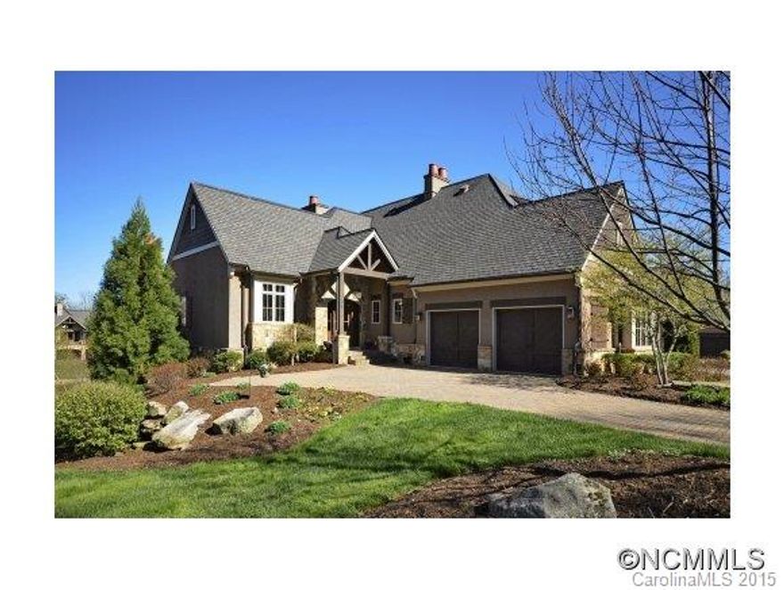 Beautiful setting with pond and distant mountain views from the great room.  Spacious terraces with outdoor fireplace make this home ideal for both indoor and outdoor living.  Open floor plan with living room, dining room and kitchen provides for flexible living. Includes an extra finished room downstairs for office or media room. Truly a home that you must see to appreciate.