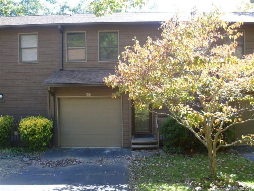 Fresh, remodeled and cozy town-house offers affordable backwoods solitude with the convenience of being close to everything. Main floor has new hardwood floors, upstairs has new carpet, fresh paint in all rooms,  new appliances and fixtures makes this the best unit in Parkway Vista.  Sit by the stone fireplace or walk right out the door to the Mountain-To-Sea-Trail. Enjoy the community pool, club-house & beautiful landscaping. Storage galore with big closets and garage. Two master suites.