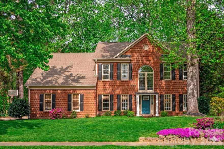 Welcome to this lovely full-brick home located in the Bradfield Farms community. Featuring a side-load garage and charming curb appeal, this home boasts high ceilings, abundant natural light, and a grand two-story foyer.

The modern kitchen features newer white cabinetry, quartz countertops, and a center island, and opens into a spacious family room with a cozy fireplace and large windows. Wide plank flooring runs throughout the main floor adding warmth and continuity.

Step outside to a large screened porch and patio with cathedral-style ceilings ideal for BBQs, entertaining, or relaxing in your beautifully wooded backyard. The patio is specially wired for a hot tub and offers plenty of space for outdoor dining or a grilling station.

Upstairs, the recently renovated primary bath features a walk-in shower, garden tub, double vanity with quartz countertops. A much sought-after bonus room offers versatility as a media room, home office, or personal retreat. Hardwoods throughout the 2nd level (expect the bonus room)

This home is immaculately maintained, easy access to 485, move-in ready, and offers the perfect blend of style, comfort, and convenience. Enjoy the extensive neighborhood amenities incl. two pools and the peaceful setting that Bradfield Farms is known for. All this with easy access to footpaths, trails, pathways, and nearby Sherman Branch mountain biking.