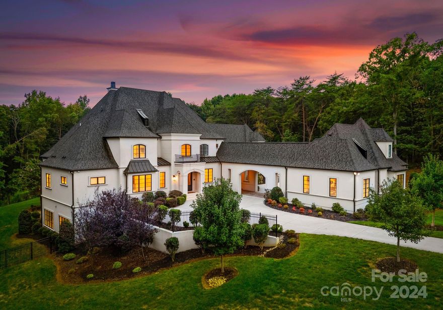 Indulge in the pinnacle of luxury at this magnificent masterpiece, custom built in 2019 by Arcadia. This 5-bedroom, 6 bath estate has a 4-car garage and is situated on over 3.5 acres.  This home wows you from the moment you enter the grand foyer, showcasing a sweeping curved staircase & abundant natural light. The heart of the home is the expansive gourmet kitchen fitted with all high end appliances & flowing effortlessly into the open concept great room. Main level hosts primary bedroom, guest bedroom, hidden scullery & office all enveloped with exquisite detail & fine attributes. Upper level with 3 add'l bedrooms & huge bonus room allowing ample space for guests. The fun begins on the lower level where you will find a state of the art 2-lane bowling alley. In addition, there is a home-theater, fitness center, billiards area & bar.  Outdoor living features a covered porch overlooking your private pool & hot tub providing the perfect opportunity to entertain family & friends.