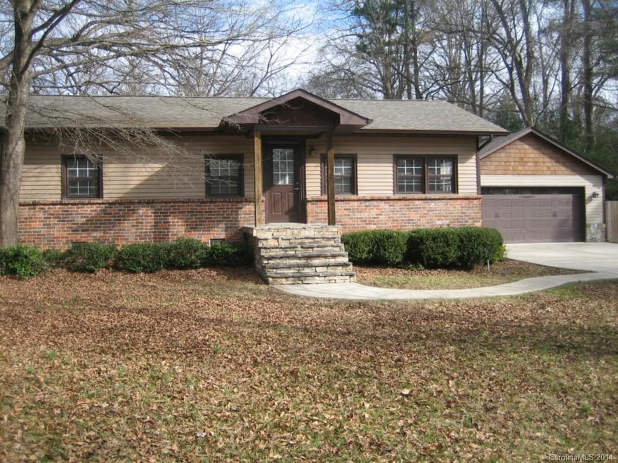 Located in historic downtown Waxhaw. Updated ranch home throughout with heart pine floors. Move-in condition. Large oversize garage with storage.