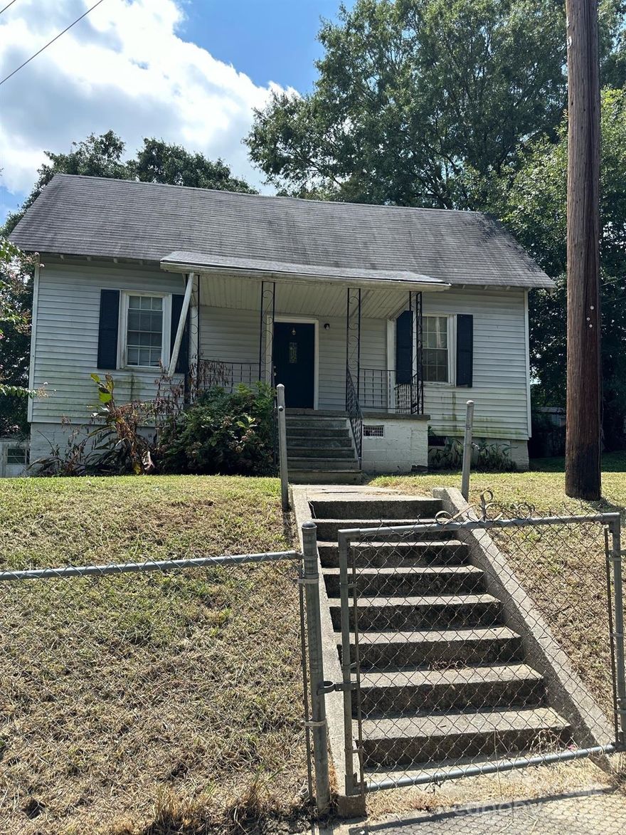 Gastonia investment potential! Come see! This home offers a private driveway, fenced yard, and deck on back. Home is sold as-is.