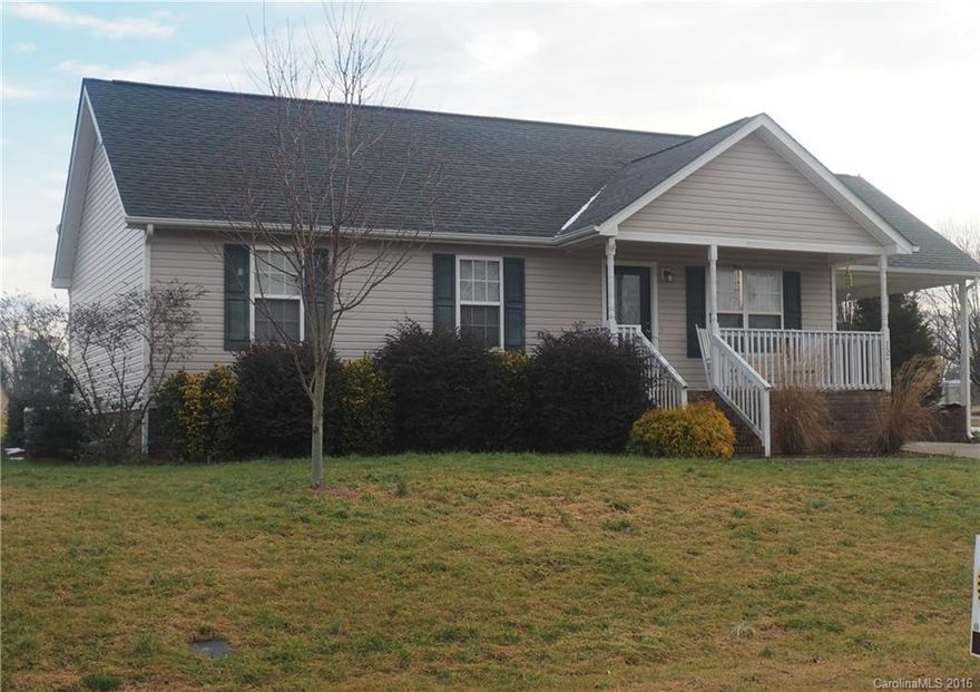 Your next home & just right for 1st time buyer. 3 br 2 ba ranch on 1/2 ac. Lovely kit cab & lg island for lots of storage with room for stools.(ISLAND CAN BE REMOVED if you prefer an eat-in kitchen). Covered front porch for those cool evenings, back porch for BBQ's & a fenced area for your pets in bk. yd. Very reasonable utility bills & vinyl siding is almost maintenance free. AHS war incl. USDA eligible.