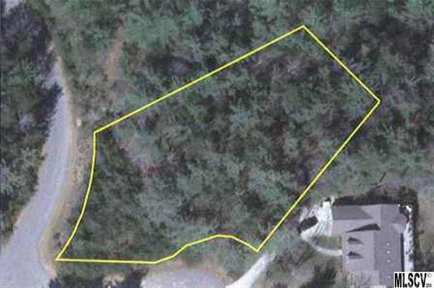 Wonderful building lot in Kings Creek! Build your dream home in this classic car collector subdivision. Beautiful wooded lots & private roads. Convenient to Lenoir and Wilkesboro.