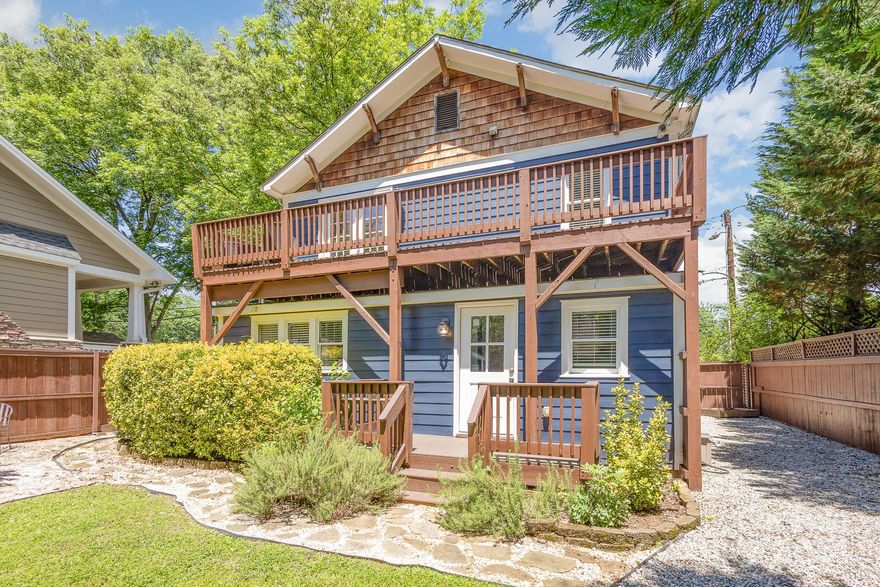 This NoDa gem is thoroughly renovated and maintained and ready for its next owner! Starting outside, find low-maintenance turf on the street side, gated gravel drive, rear deck, 2nd story balcony, hardscaped outdoor sitting area, shed, 6-foot fence, and a large backyard perfect for entertaining! Step inside and find a sunroom, hardwoods throughout the living areas, exposed brick columns, and a GORGEOUS kitchen - custom 42" cabinetry with display shelving, granite counters, stainless steel appliances incl. gas oven/range, tile backsplash, and bar inlet perfect for additional seating. Main floor laundry, full bath w/ walk-in shower, and flex space that can serve as bedroom or home office! Upstairs has loft area with wet bar, 2 guest bedrooms, and master suite with walk-in closet, entry sitting area, soaring bedroom, and a dream bathroom - jacuzzi tub, dual vanities and oversized walk-in tiled shower. Minutes from shopping and dining options, Plaza Midwood, and more!