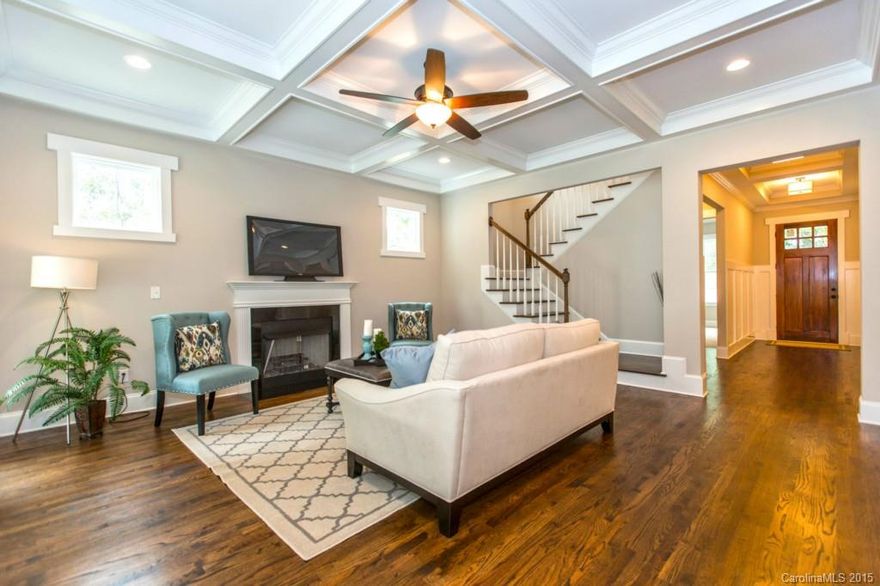 Your family will love this elegant home in Plaza Midwood. From the spectacular open kitchen with wet bar to the Custom cabinetry with huge island featuring Granite tops and SS appliances. After the party Relax in your spacious owners suite with slipper tub. This home has it all - great location, upscale features, rocking chair front porch, covered back porch for outdoor entertaining and more! Home completion date September 30. Photos are of another home and representative of intended finishes.