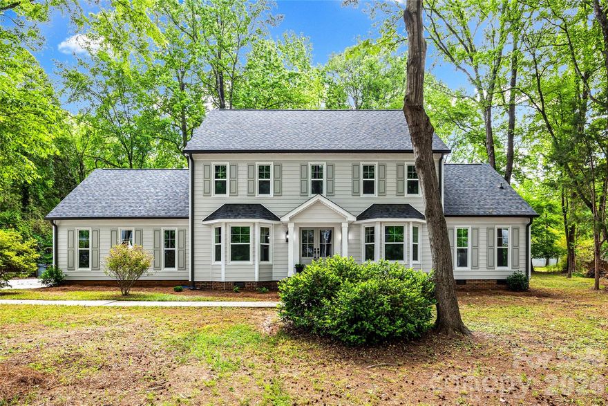 Completely renovated home featuring a new roof (2026), energy-efficient windows (2026), insulated exterior doors, reinforced CertainTeed insulated siding, and new 6-inch gutters. Additional updates include new garage doors (2026) and a fully renovated kitchen with new cabinetry, quartz countertops, and GE appliances.
Major system upgrades include a new HVAC system (2026), with a secondary unit installed in 2021, a new 80-gallon water heater (2026), and a new Bryant 200-amp electrical panel.
The home offers two primary suites on both the main level and the second floor, along with bonus rooms on the second and third levels. Bathrooms have been fully renovated with new fixtures and tile, including two full baths with soaking tubs and glass shower doors.
Situated on a quiet cul-de-sac, this move-in-ready home features a private, flat backyard and a new deck (2026).