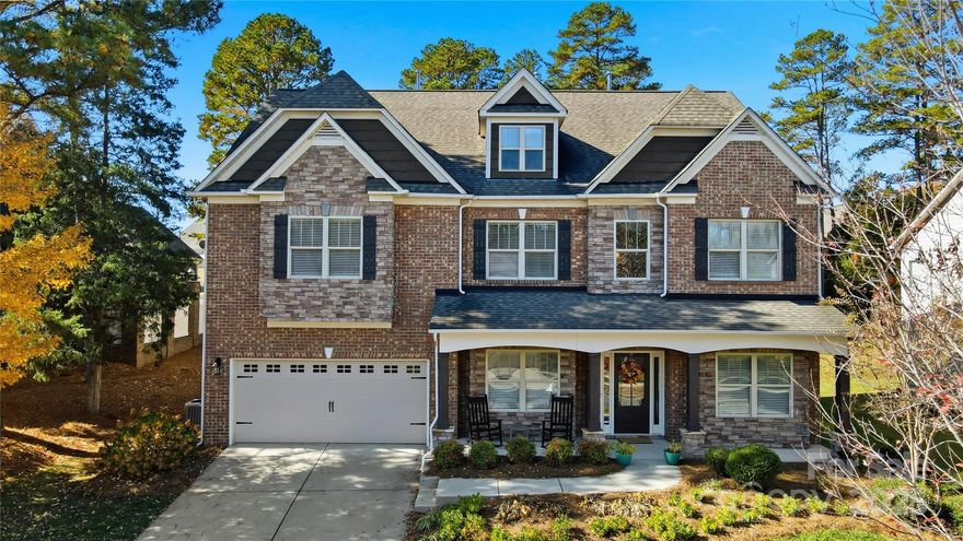 The Ultimate Multigenerational Estate in Kellswater Bridge! Rarely does a home offer this much versatility and value. Boasting over 4,500 sq. ft. of functional luxury, this 6-bedroom, 5-bath masterpiece is designed for modern living. Step through the grand entrance into a bright, open layout with soaring vaulted ceilings. The main level features a formal dining room perfect for grand-scale entertaining, a guest suite with a full bath, and a chef’s kitchen with an oversized island and a premium whole-home water purification system. Escape to the third floor, a true "home within a home" featuring two bedrooms, a spacious second living area, and a private kitchenette—the perfect setup for aging parents, a nanny suite, or a private retreat. The primary suite is a sanctuary of its own, complete with a luxurious flex space for a private sitting room, home office, or gym. Outdoor living is redefined on your screened-in patio, overlooking a rare, wooded backyard that extends beyond the tree line for unmatched peace and privacy. Nestled on a quiet cul-de-sac with minimal traffic, you are just minutes from top-tier community amenities including an outdoor pool, fitness center, sport courts, and walking trails. Experience the best value for space in Kannapolis!