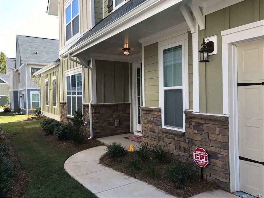 Stunning home with open floor plan, large granite kitchen island, stainless steel appliance, hardwood floor throughout the main level.  Master down; laundry on both first and second floors; second floor loft/office overlooks the soaring family room with a nice window wall on first floor.  Maintenance free yard.  Great location and great schools!