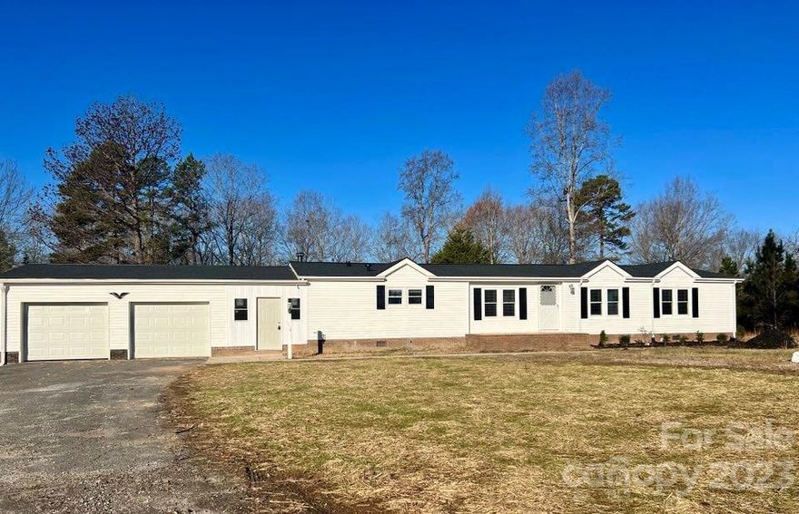 Newly remodeled 3 bedroom 2 1/2 bath 1926sq ft.  New Roof, all new floors; new vanities in bathrooms, new sinks and toilets.  Completely remodeled kitchen with shaker style cabinets, all new stainless appliances, giving the kitchen a modern look with center island. Washer and Dryer included. Very open and airy.  Breezeway leading to a large 2 car garage with electric doors.  All of this on an acre in Mooresville.  This one will sell quickly.  

Listing price is $269,000.00 with $5000.00 seller credit with full price offer.
