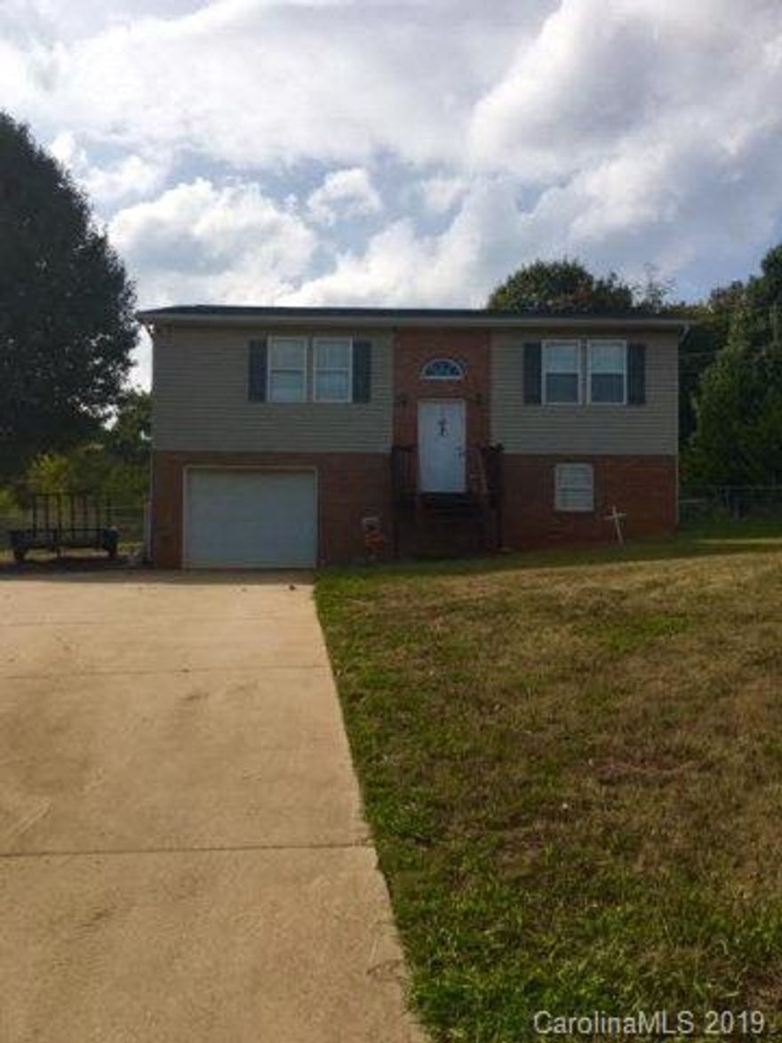 Great value on this updated home! Let's start w/ the kitchen.. new stylish cabinets, granite counters, closet pantry, and tile backsplash. Main floor has laminate hardwoods, updated light fixtures , wood blinds, no carpet anywhere on main floor! Spacious master w/ walk-in closet. Hall bath with new vanity w/ granite top and and linen closet. Downstairs in 3rd bedroom and laundry/utility room with plenty of storage area. Outside enjoy covered back deck w/ fully fenced in yard. One car garage w/ opener and extra graveled parking area. Storage building w/ power and metal carport. NEW 30YR ROOF 2016. Over 40k in upgrades!!! Don't miss out on this one while interest rates are still low!