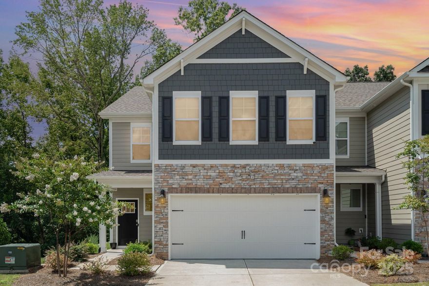 End Unit – Only 2 years old! This beautifully maintained four-bedroom townhome offers a thoughtful layout, including a guest bedroom and full bath on the main level. Natural light pours into the east-facing great room each morning, creating a bright and welcoming atmosphere. Covered entry porch leads to an open foyer that flows into the stunning island kitchen and spacious great room. Kitchen features a gas range, stainless steel dishwasher, and 
beautiful cabinetry. Unmatched privacy with no neighbors on the side or rear; it truly feels like living in your own private forest retreat! Upper-level primary bedroom includes a thoughtfully designed bath and walk-in closet. 2nd floor laundry room saves time and steps. Versatile loft upstairs offers space for movie nights, a workout area, or a cozy reading nook. Two additional guest bedrooms and a full bathroom complete the upper floor. Truly a find at this price! Deako smart switches throughout control lighting from mobile app!