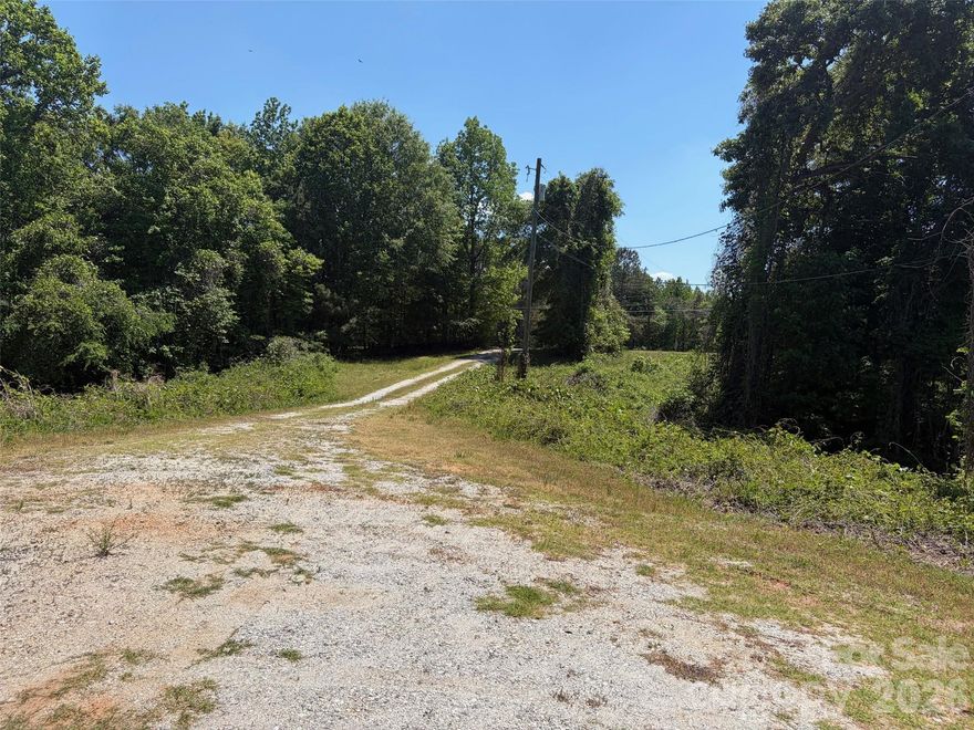 11.97 acres consists of rolling hills, pines and hardwoods, creek bottom, and scenic hilltop views. This lot has an established driveway to a homesite with septic, power, and public water. Located off SC Hwy 49  approximately 2.5 miles from downtown Union. There is another possible homesite and/or room for a building, barn, or shop. An abundance of wildlife from deer, turkey, rabbits, squirrels, quail, and doves. No HOA but minimum deed restrictions to ensure like-kind properties. Power and public water are located on the property for use. Conveniently located to Greenville, Spartanburg, Charlotte, and Columbia; and within 10 minutes from downtown Union.