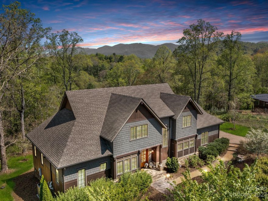 Extraordinary 3 br/2.5 ba home built in 2016 w/ magnificent features & accommodations throughout. Situated on 1.09 acres, the level yard is beautifully landscaped w/ a serene woodsy border against a stunning backdrop of long-range mountain views. The 2-story living room touts a cathedral ceiling lined w/ exposed wood beam, a floor-to-ceiling stone gas logs fireplace & a wall of windows granting a blend of mountain & sylvan views. Kitchen is spectacular w/ stainless steel appliances, kitchen island w/ breakfast bar, farmhouse sink, gas range/oven, & walk-in pantry. Screened rear porch delivers inspiring surrounding vistas! At the day's end, you'll love retreating into the divine primary suite w/ tray ceiling & spa-like bath w/ walk-in shower, dual vanities & huge walk-in closet. Bonus room, office, laundry & attached 2-car garage also on main. Upper level includes 2 guest rooms, full bath & family room. Crafted in highest quality & style! Convenient to downtown, interstate & amenities.