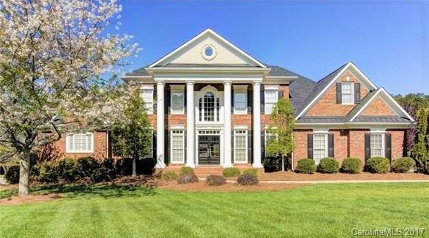 Immaculate home with many upgrades Popular Amherst plan on a corner lot with well landscaped yard for privacy, lg rear deck plus a stone patio, full irrigation system. HW floors thruout most of main level. Gorgeous Kit w/granite tops, tile backsplash, honey maple cabinets, ss appliances & recessed lighting. 1st floor MBR w/adjoining office & 2 lg walkin closets, huge bonus room up. 9' ceilings on both floors, central vac, dual staircases, custom blinds & plantation shutters. A must see!