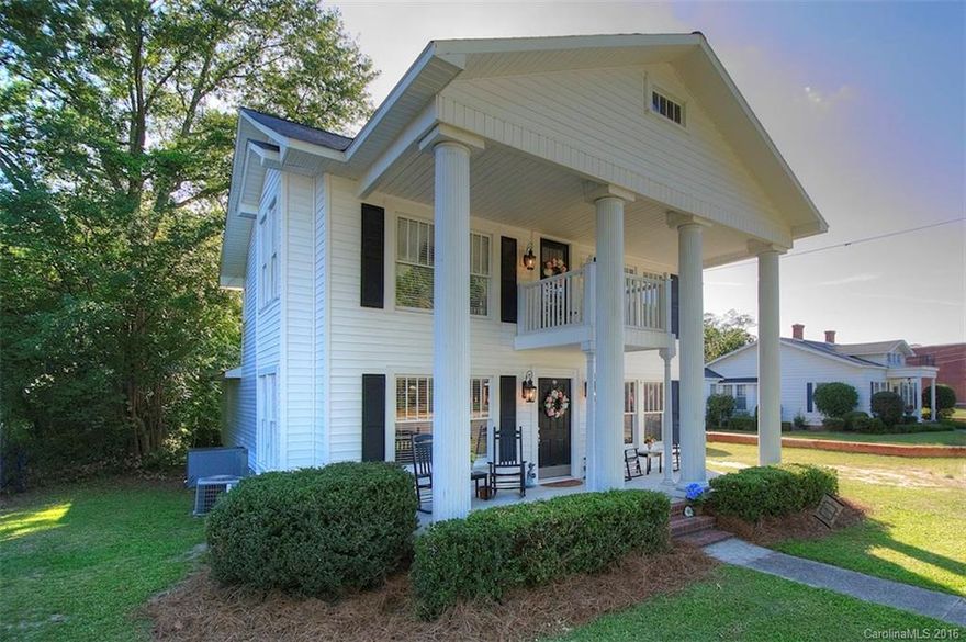 4 bedroom / 3 bath home on .35 acres with updates in Kershaw, SC. Plantation style with welcoming front porch and upstairs veranda. Kitchen features granite and stainless steel appliances. Built in cabinets throughout, upgraded architectural features, master bedroom and full bath on main level. Additional full bath on main with claw foot tub. Peaceful backyard with mature trees, double level deck, storage building and well maintained yard. Move in ready home with neutral features.