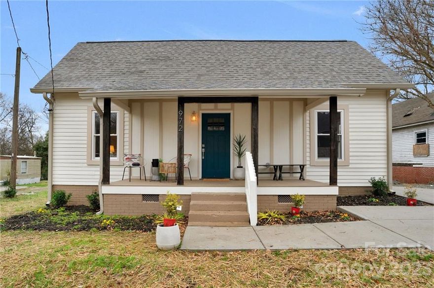 Completely remodeled 3 bed/1 bath bungalow home is ready for new owners! Open floor plan, high ceilings and  spacious family room and eat in kitchen makes the space feel warm and inviting! Luxury Vinyl flooring throughout, ceiling fans & custom wood detail are just some of the special features! Buyers will love the new kitchen with white cabinets, quartz countertops, large farm sink, tiled backsplash, reclaimed wood shelves, updated lighting, stainless electric range/oven & microwave. All three bedrooms have ceiling fans and the brand new full bathroom features tiled bath, new vanity & designer lighting. Enjoy relaxing on the front covered porch or the back deck overlooking the large flat fully fenced back yard! All new plumbing, electrical system, new windows, new doors and new roof! This turn key home won't be available long, so schedule your showing today!