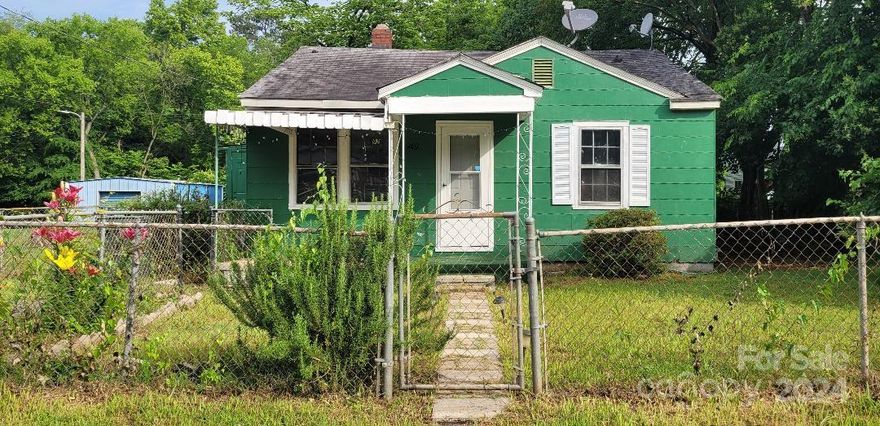 Don't miss this INCREDIBLE OPPORTUNITY! Whether you're an investor looking for a promising opportunity or a homebuyer with a vision searching for the perfect place to make home, this is the one. Adorable 2 Bed/ 1 Bath ranch home sits on a partially fenced lot with immense potential. No HOA. Conveniently located near restaurants, parks, shops, and Interstate I-77. This home features a nice floorplan, hardwood floors, and spacious kitchen. Property is being sold "As-Is". CASH ONLY. Schedule a viewing today and embark on the investment opportunity you've been envisioning!