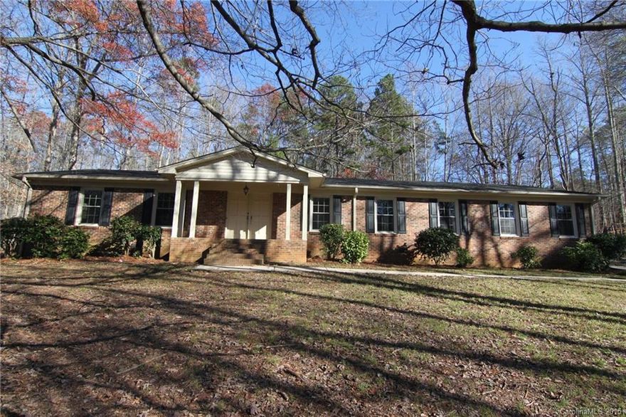 Brick 4 Br ranch in beautiful country setting w/private yard - NO CITY TAXES! Move in ready, all new paint & flooring throughout. Open kitchen offers ample cabinets that are refinished, beautifully match granite & stainless appliances. Large den w/masonry fireplace open to kitchen. Priced low to meet requirement for upgrades to sub structure & offers opportunity for builder or investor to complete work. Engineers report & contractor estimate available upon request. Bring all offers.