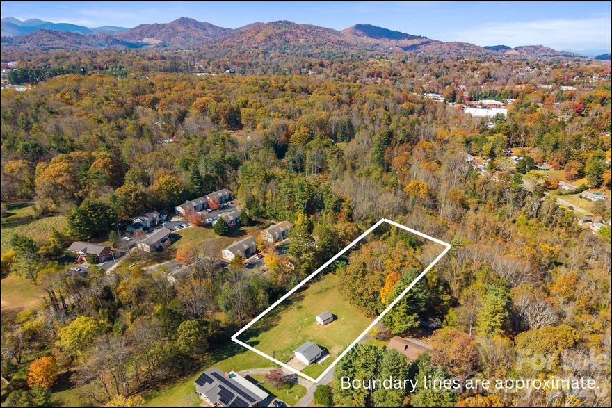 The West Asheville Equity-Play: Modern Cottage on 2.31 Scalable Acres
The Rare "Buy & Hold" with Immediate Yield
It is exceptionally rare to find a property that offers immediate high-performing cash flow paired with the long-term upside of a multi-unit development site. Located in the rapidly appreciating foothills of West Asheville, this 2.31-acre estate features a beautifully renovated 1-bedroom, 1-bathroom cottage that is fully turnkey. Whether you are looking for a high-performing short-term rental (STR), a chic primary residence with room to grow, or a proven long-term income producer, this property generates revenue the moment you close.

The Cottage: Modern, Minimalist, & Move-In Ready
Inside, the home defines "mountain modern" with bright, open-concept living, updated appliances, and crisp finishes that appeal to the discerning modern renter. The oversized deck serves as an outdoor living room, offering a front-row seat to long-range mountain sunsets and the profound quiet of the foothills—all while remaining minutes from the city's pulse.

The Land: Your Development Canvas
The true value lies in the expansive, mostly cleared, and gently rolling topography. Zoned for Low-Density Multifamily, the site is a developer’s dream or a homeowner’s private sanctuary.

Scalability: Ample acreage to add additional dwellings, guest houses, or a private family compound.

Infrastructure: Extensive parking for multiple vehicles or equipment, plus a large central storage shed perfect for a workshop or conversion.

Topography: The "easy-build" gentle slope significantly reduces site-prep costs for future expansion.

Location: The Best of Both Worlds
Enjoy the "deep-woods" feel without the isolation. You are less than 10 minutes from the breweries, boutiques, and eclectic energy of Haywood Road, and under 15 minutes from the world-class culinary scene of Downtown Asheville.

The Bottom Line
This is a strategic acquisition for the buyer who understands the value of Cash Flow + Land Banking. Whether you’re an investor seeking an equity-rich development site or a homeowner looking for privacy with an income-producing "safety net," this property represents one of the smartest opportunities in the Western North Carolina market.