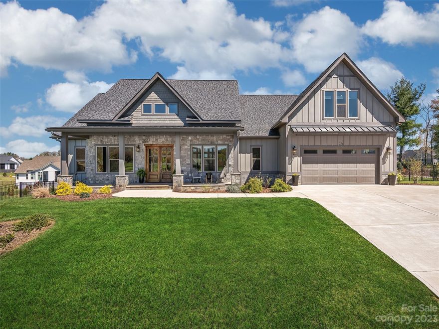 Luxury living at Mills River Crossing! This 4 bedroom, 3.5 bathroom home has a combination of modern elegance and comfortable living. You'll immediately be struck by the beautiful open floor plan and high-end finishes throughout. The kitchen is a chef's dream, boasting stainless steel appliances, custom cabinetry, and a large center island perfect for meal prep or entertaining guests. The 4 spacious bedrooms all feature walk-in closets and ceiling fans, providing comfort and convenience. The primary bedroom is a true retreat, with an en-suite bathroom with a spa-like shower and soaking tub. The home also has a central vacuum system and fiber optics for optimal connectivity as well as remote control blinds for shade or to enjoy the year round views. Floating ceiling in living and dining areas. The true highlight of this property is the custom heated and lighted Gunite pool with a commercial-grade heater, UV filters, and auto-fill feature all controlled by WIFI. Call for a showing today.